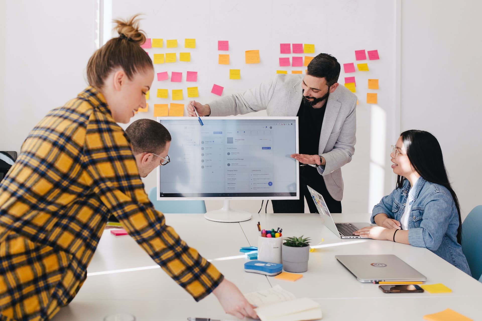 Team planning out a website design for a client in the UK